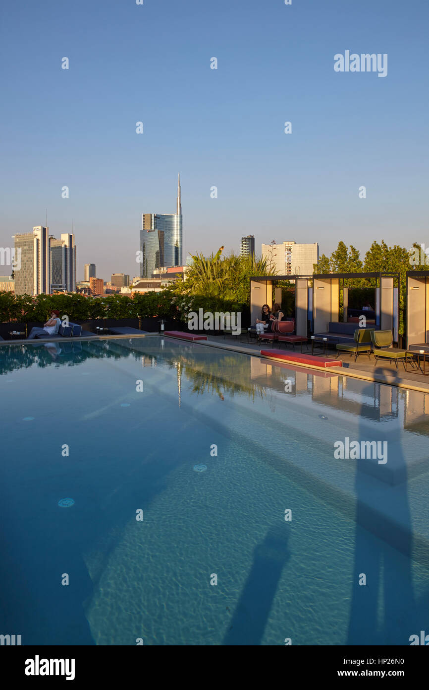 View of Unicredit Tower in Porta Nuova district with the swimmingpool in the foreground, Milan, Italy Stock Photo