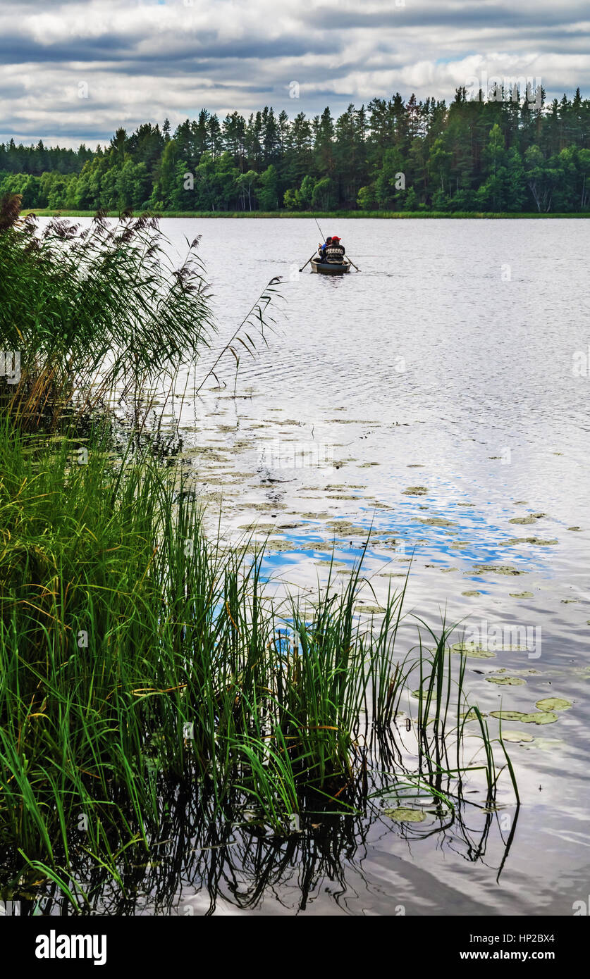 Fishing on the lake Stock Photo - Alamy