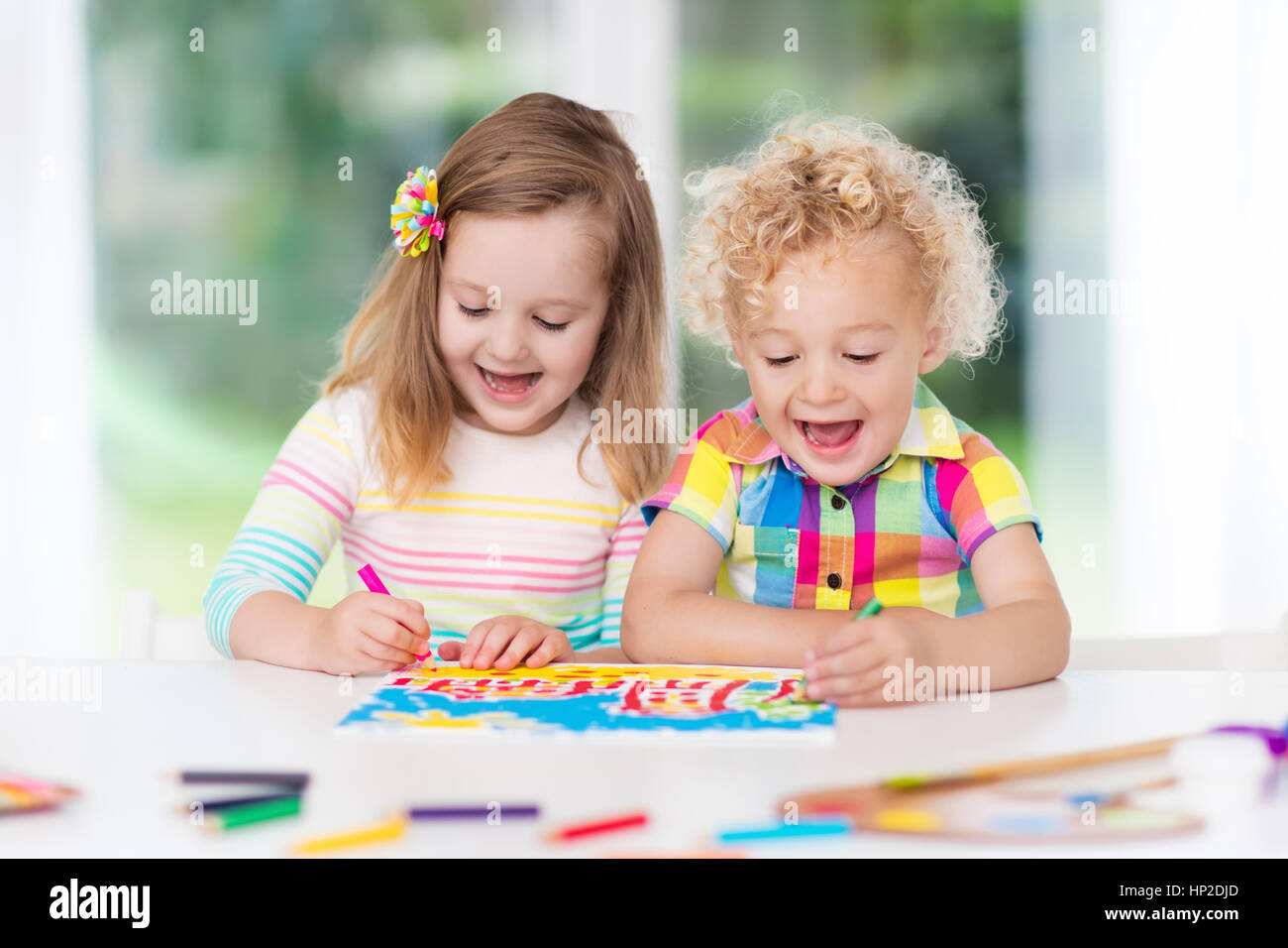 Little Boy And Girl Draw Together In White Room With Window Kids Doing Homework Painting And Drawing Children Paint With Paintbrush Color And Penci Stock Photo Alamy Little Boy And Girl Draw Together In White Room With Window Kids Doing Homework Painting And Drawing Children Paint With Paintbrush Color And Penci Stock Photo Alamy
