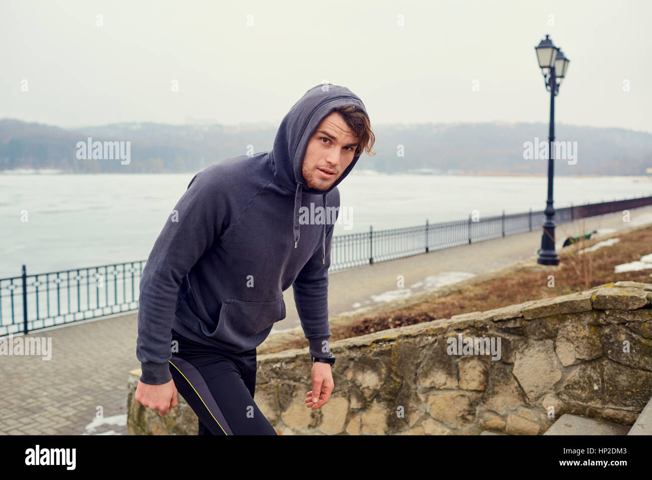 Young gay man athlete in sportswear in a park for a jog Stock Photo - Alamy