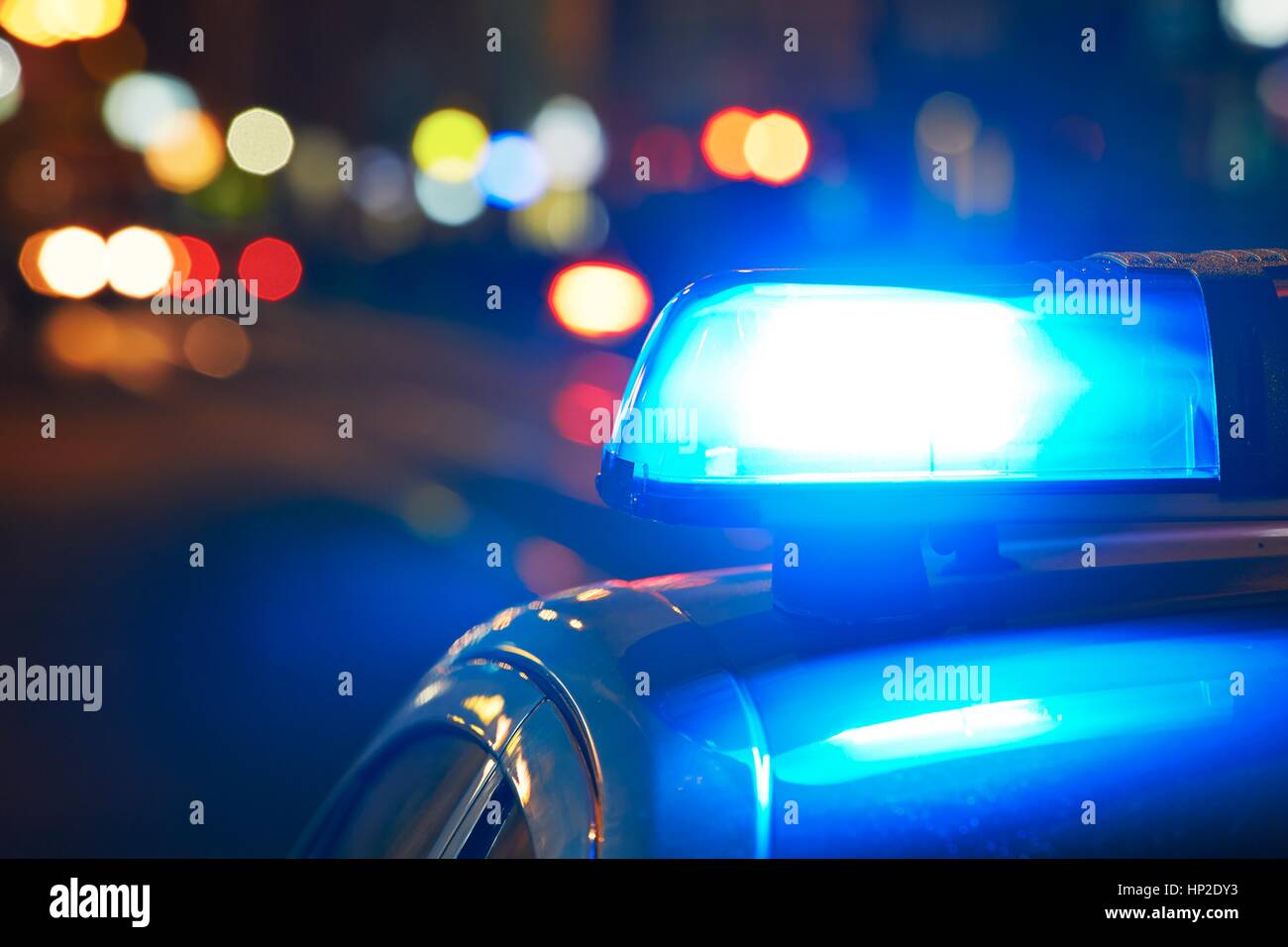 Police car on the street at night Stock Photo
