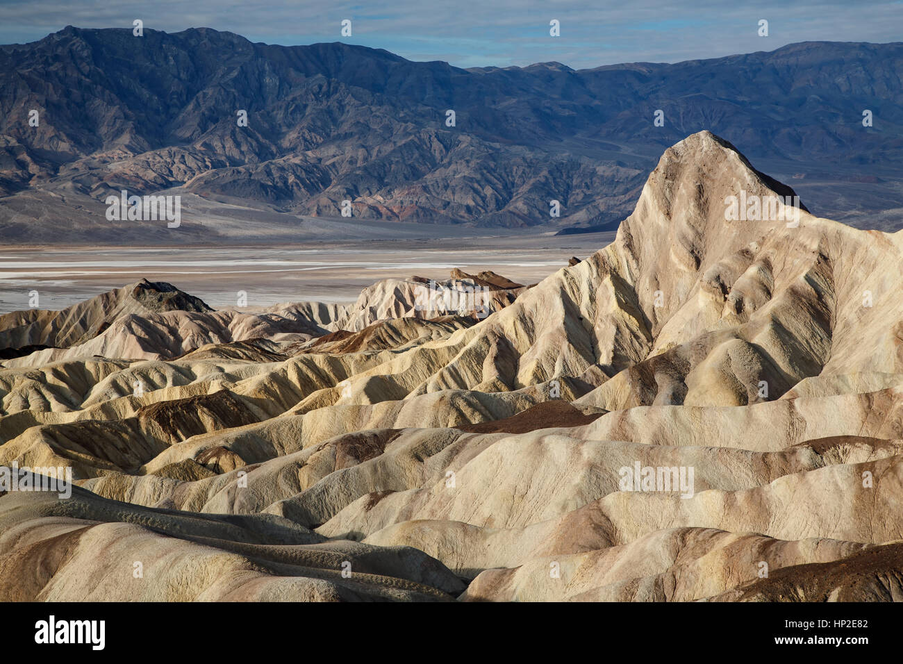 Manley Beacon, badlands and Panamint Range, Zabriskie Point,  Death Valley National Park, California USA Stock Photo