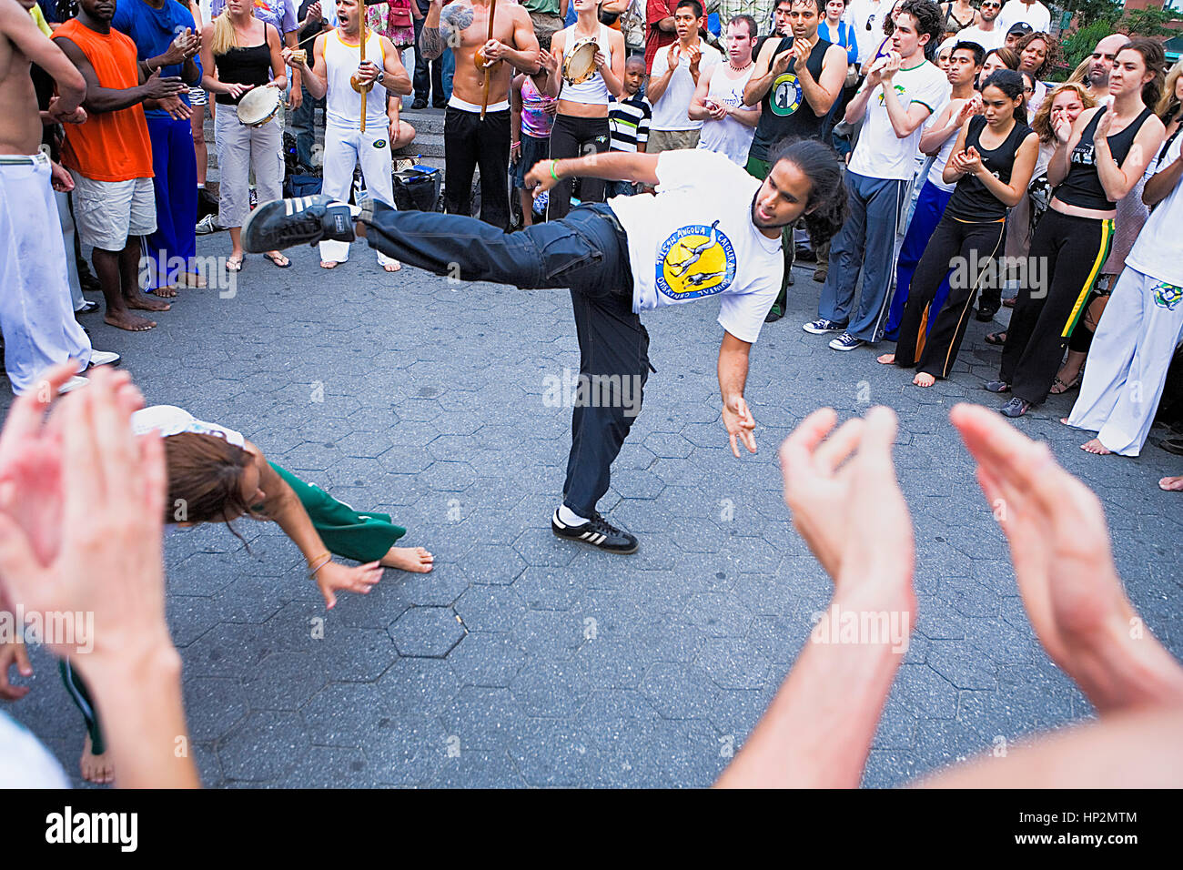 Capoeira, martial art of dancing, artist, busker , performed,New York City, USA Stock Photo