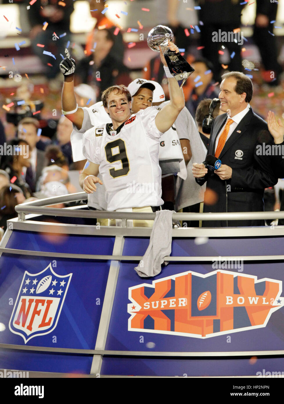 New Orleans Saints quarterback Dree Brees holds the Vince Lombardi Trophy at the Super Bowl in Miami, Florida on February 7, 2010. Photo by Francis Specker Stock Photo