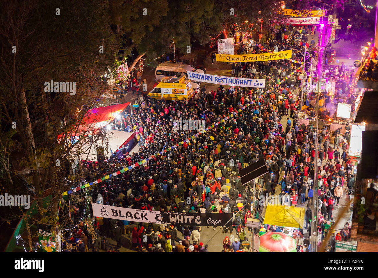 POKHARA, NEPAL 30 December 2016 Revelers crowd the street during the
