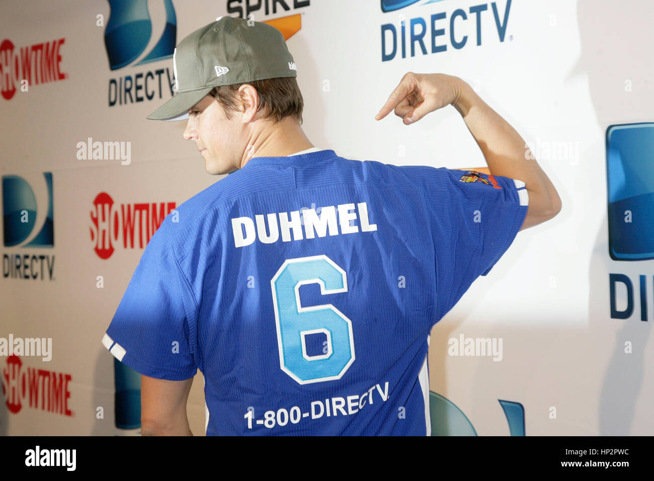 Josh Duhamel shows off his misspelled jersey at the DIRECTV’s Fifth