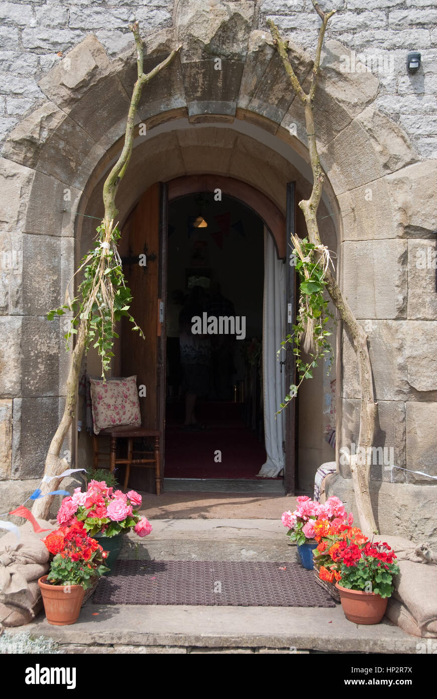 Derbyshire, UK - July 20 2014 - Little Longstone Congregational Chapel entrance dressed and decorated on 20 July for the Flower Festival Stock Photo