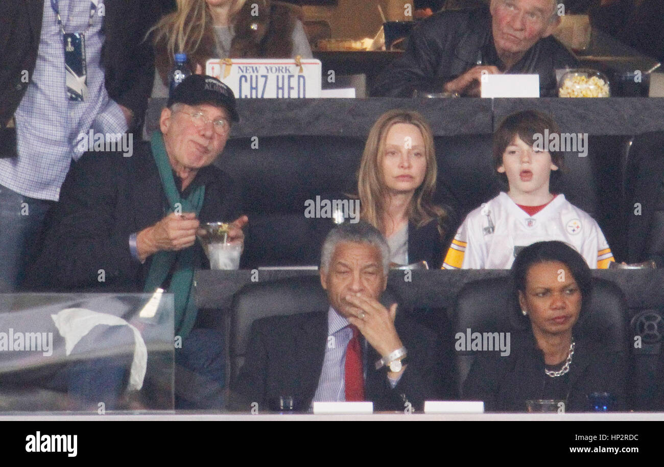 Harrison Ford with Calista Flockhart and son, Liam at Super Bowl XLV football game in Arlington, Texas on February 6, 2011. Photo by Francis Specker Stock Photo