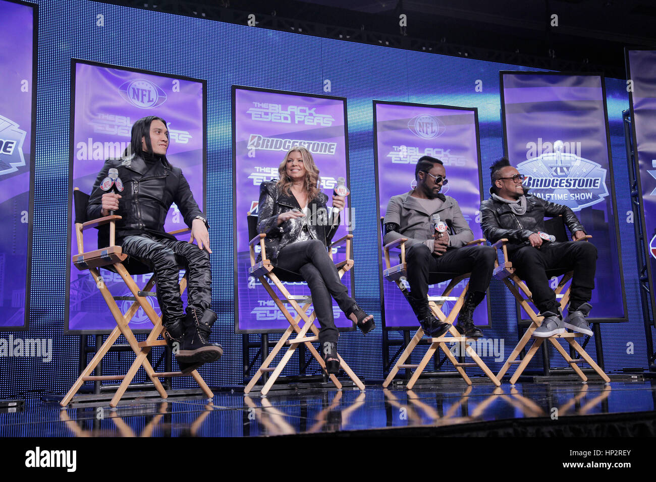 The Black Eyed Peas, from left, Taboo, Fergie, Will.i.am, and apl.de.ap at a press conference for the half-time show for Super Bowl 45 on February 3, 2011 in Dallas, Texas. Photo by Francis Specker Stock Photo
