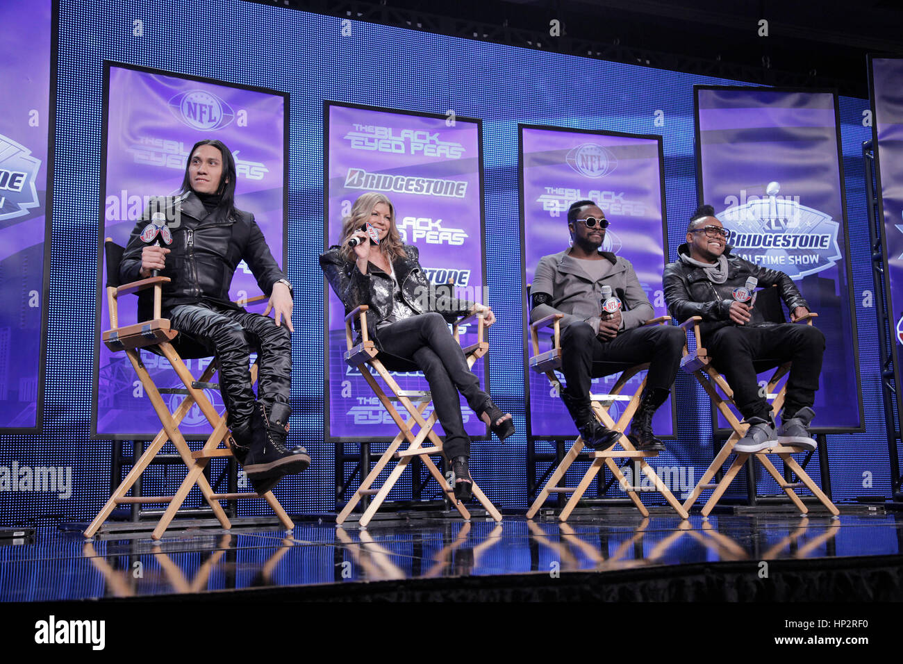 The Black Eyed Peas, from left, Taboo, Fergie, Will.i.am, and apl.de.ap at a press conference for the half-time show for Super Bowl 45 on February 3, 2011 in Dallas, Texas. Photo by Francis Specker Stock Photo