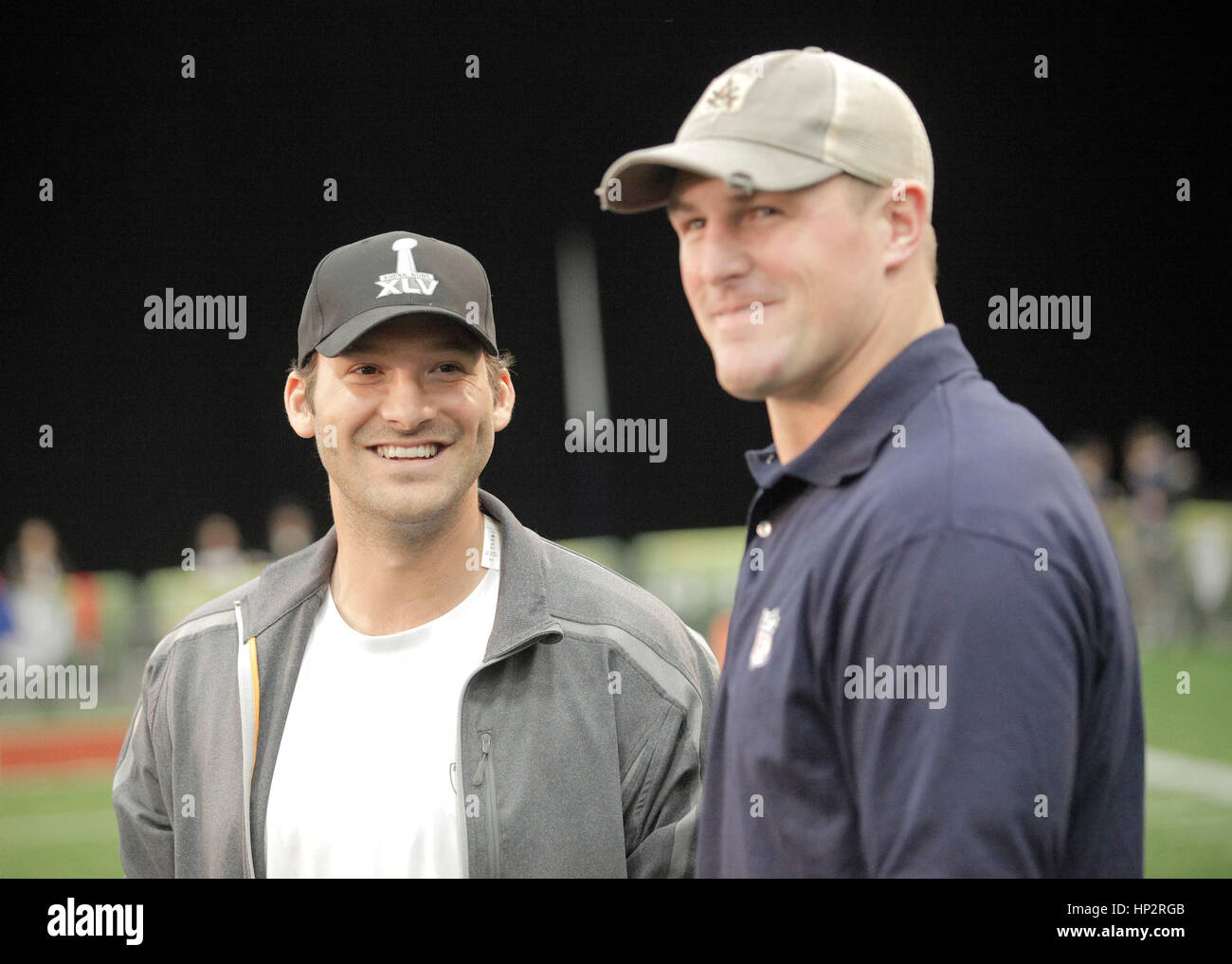 Dallas Cowboys quarterback Tony Romo, left, with teammate Jason Witten at the Tazon Latino flag football game at Super Bowl NFL Experience at the Dallas Convention Center on February 2, 2011 in Dallas, Texas. Photo by Francis Specker Stock Photo