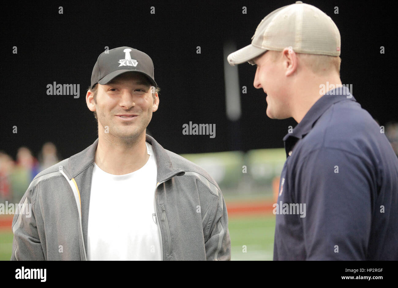 Dallas Cowboys quarterback Tony Romo, left, with teammate Jason Witten at the Tazon Latino flag football game at Super Bowl NFL Experience at the Dallas Convention Center on February 2, 2011 in Dallas, Texas. Photo by Francis Specker Stock Photo