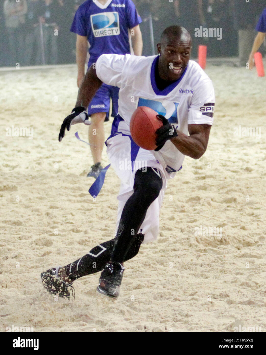 Terrell Owens runs for a touch down at Directv's Sixth Annual Celebrity