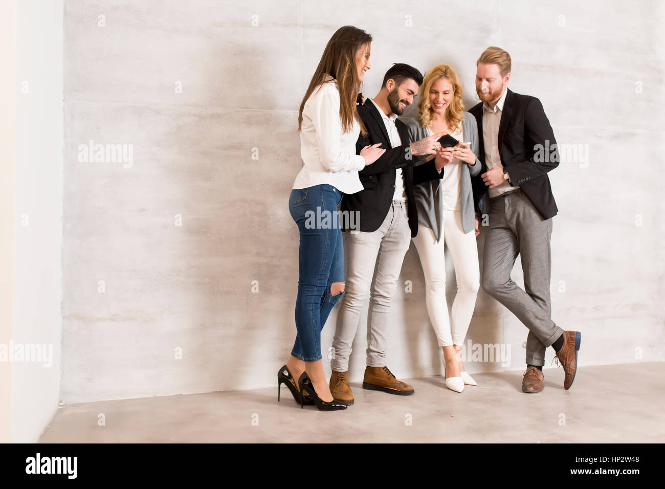 Group of hands holding cell phones hi-res stock photography and images ...