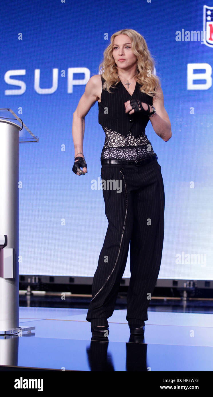 Singer Madonna dances a salsa during a press conference for the Super Bowl XLVI half time show in Indianapolis, Indiana on February 2, 2012. Photo by Francis Specker Stock Photo