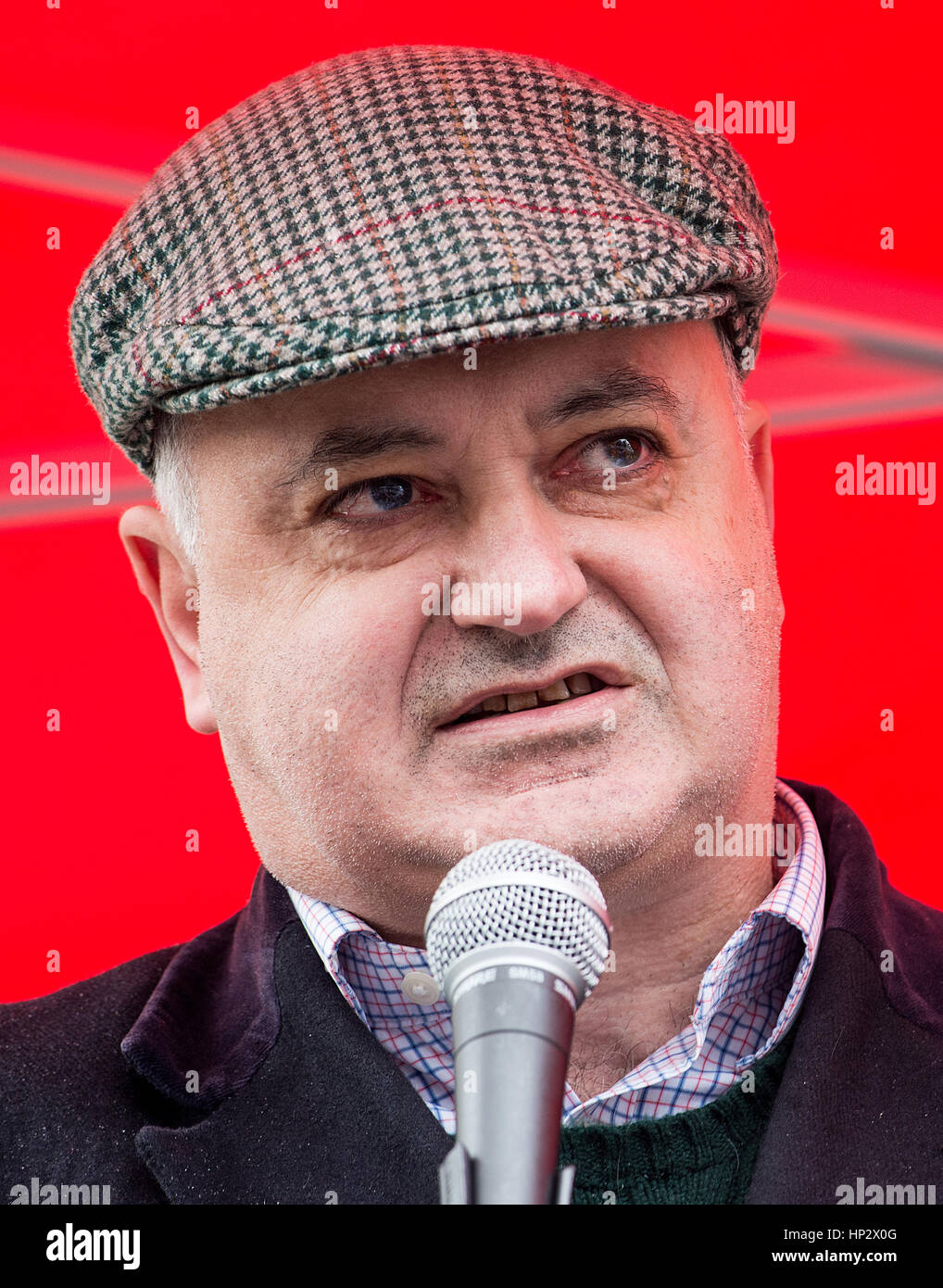 Andrew Murray from UNITE Union, gives a speech at the Stop Trump's Muslim Ban protest march, outside the US embassy in Grosvenor Square, London, UK. Stock Photo