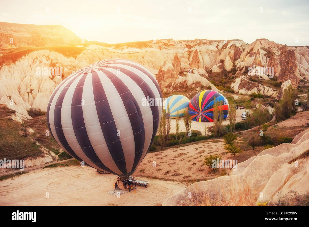 Colorful hot air balloons flying over Red valley at Cappadocia Stock ...