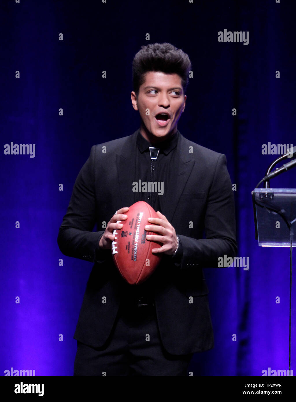 Singer Bruno Mars talks at the press conference for the Super Bowl Halftime Show on January 30, 2014 in New York, NY. Photo by Francis Specker Stock Photo