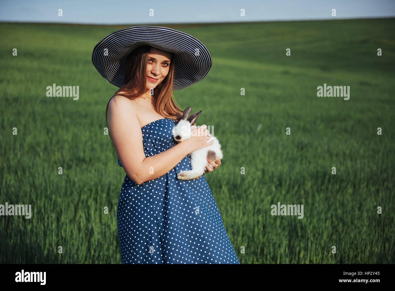 young pregnant woman in a field of wheat Stock Photo - Alamy