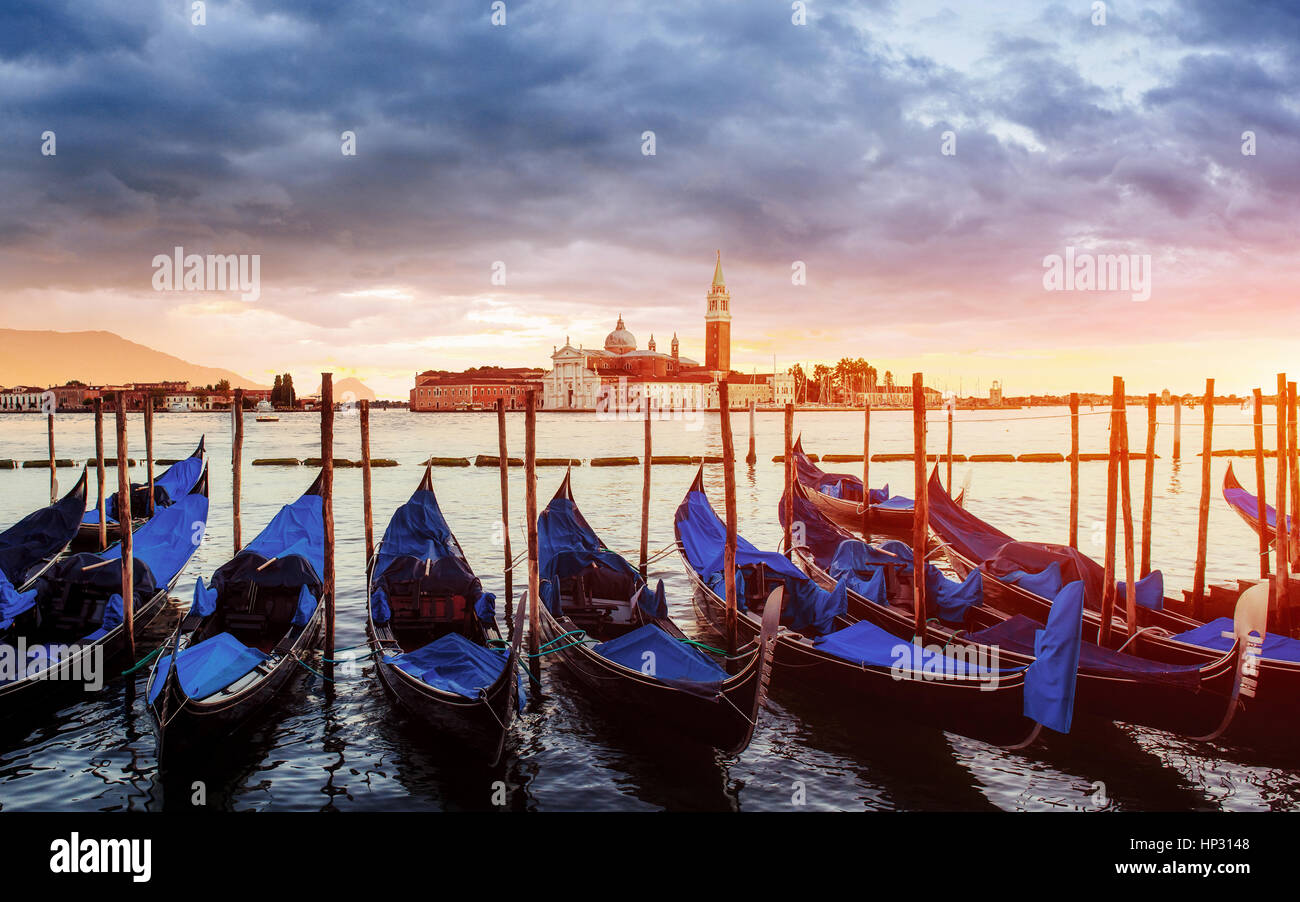 City landscape. Fantastic views of the gondola at sunset, moored Stock ...