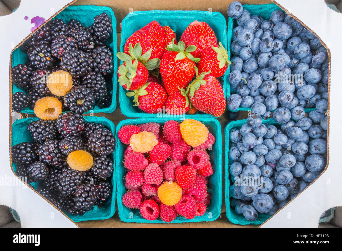Farmers Market box of mixed berries Stock Photo