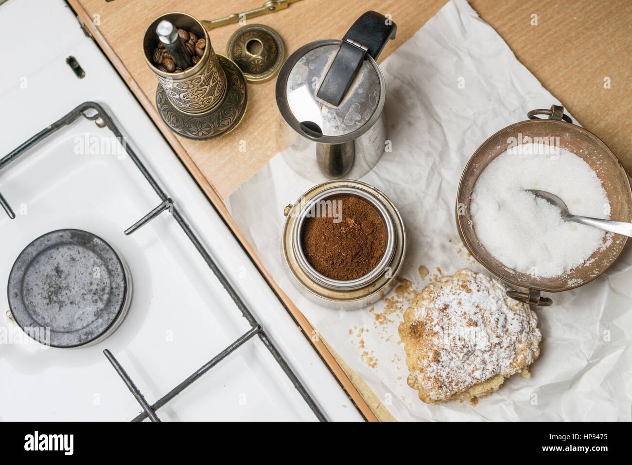 Kitchen still life with coffee maker, apple pie and gas cooker Stock Photo