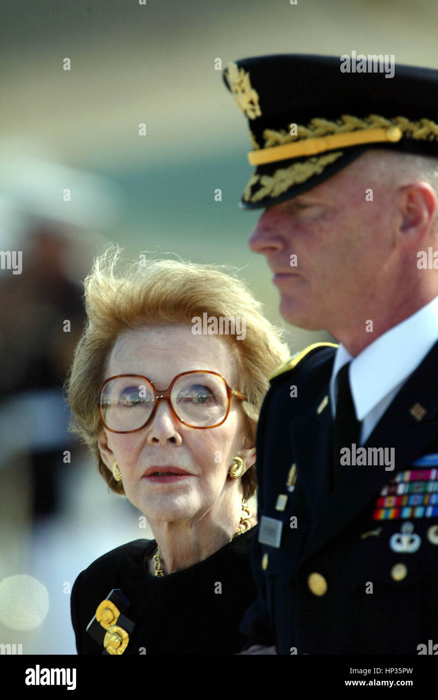 Former First Lady Nancy Reagan is escorted by Major General Galen ...