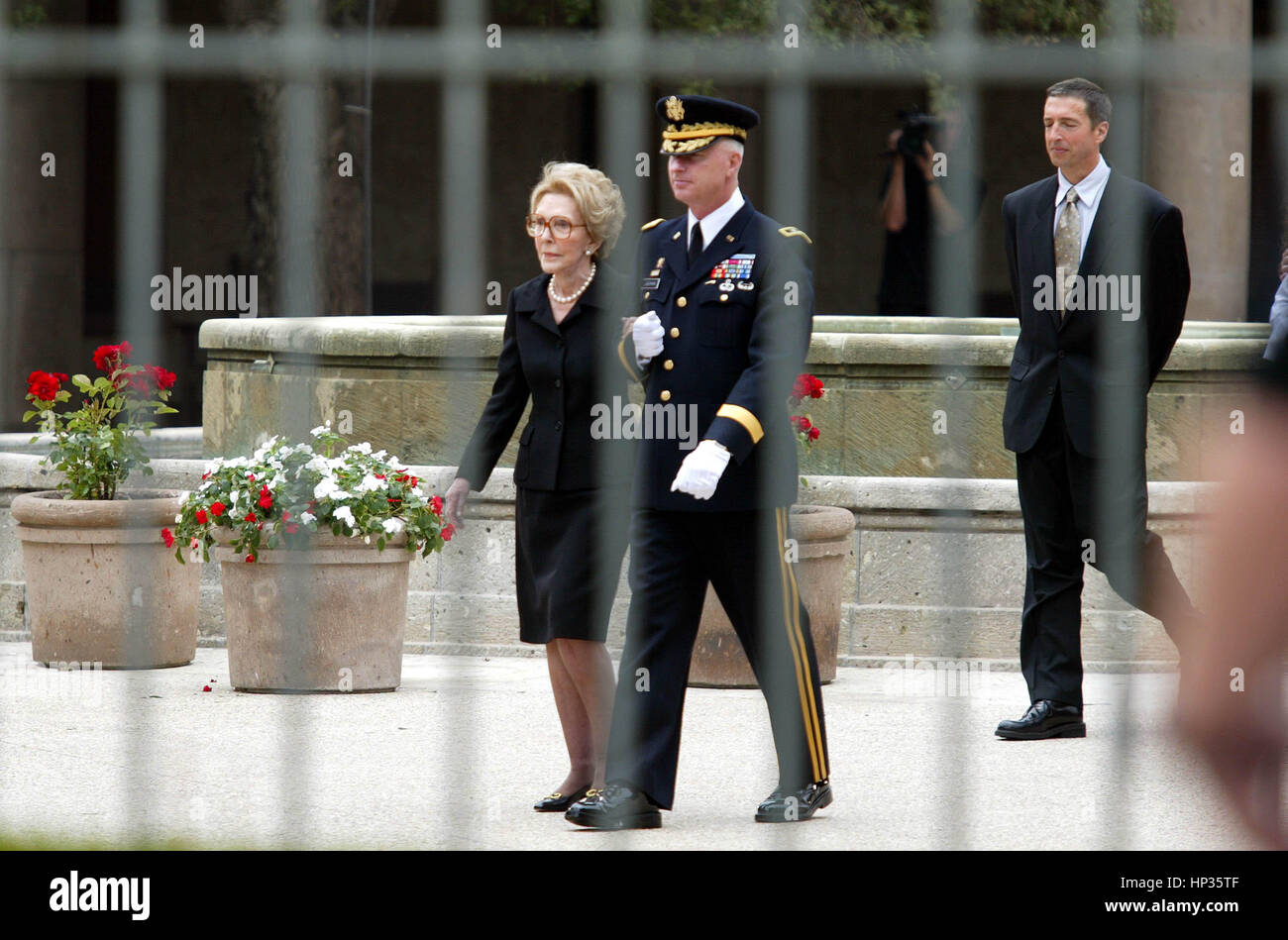 Former First Lady Nancy Reagan is escorted by Major General Galen ...