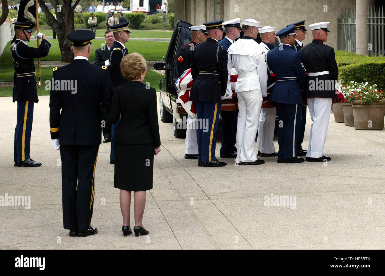Former First Lady Nancy Reagan is escorted by Major General Galen ...