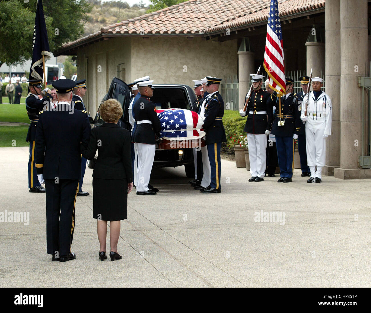 Former First Lady Nancy Reagan is escorted by Major General Galen ...