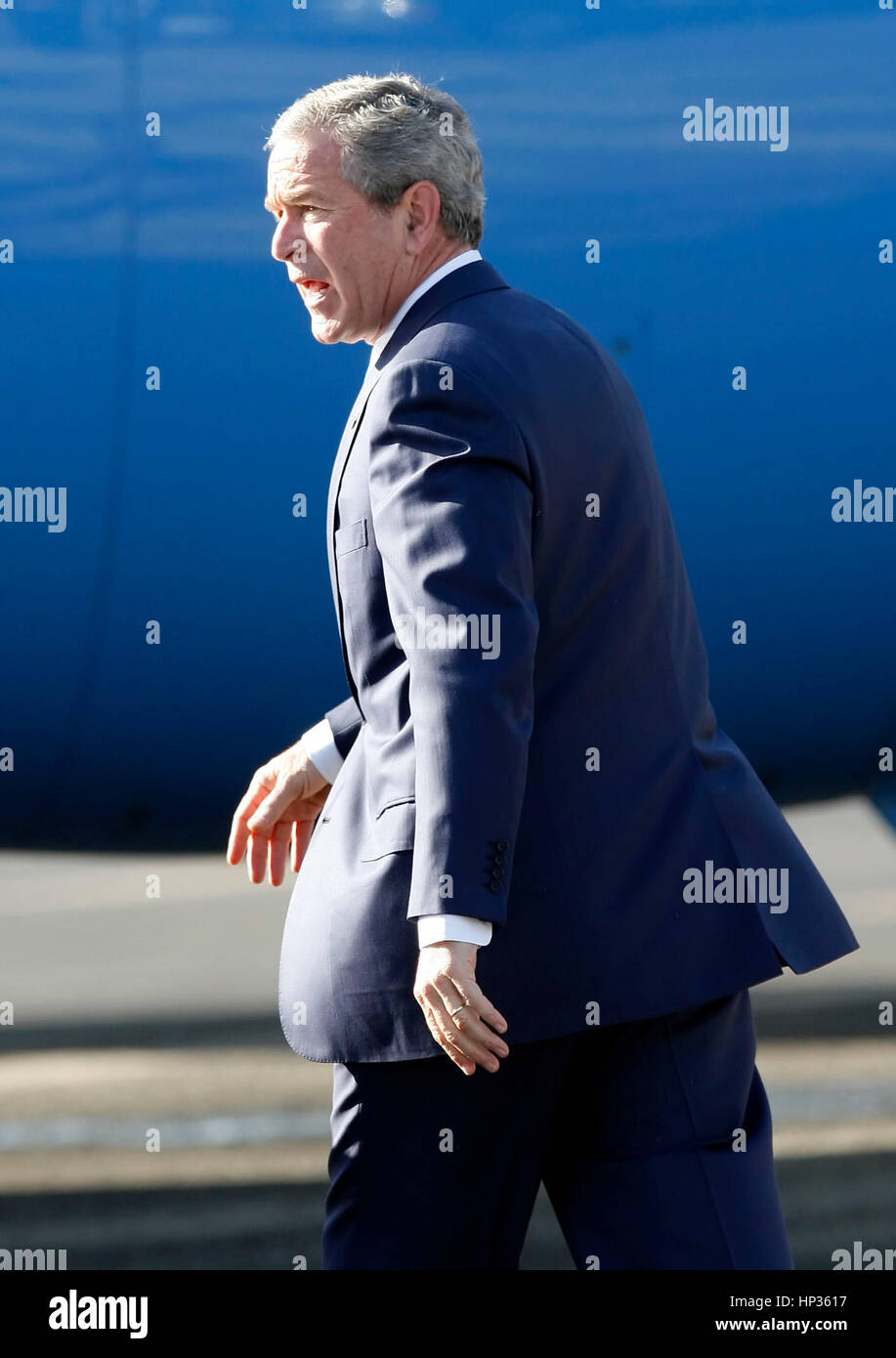 President Bush walks on the tarmac at the Palm Springs International Airport before boarding Air Force One in Palm Springs, Calif. on Monday, April 24, 2006. Photo by Francis Specker Stock Photo