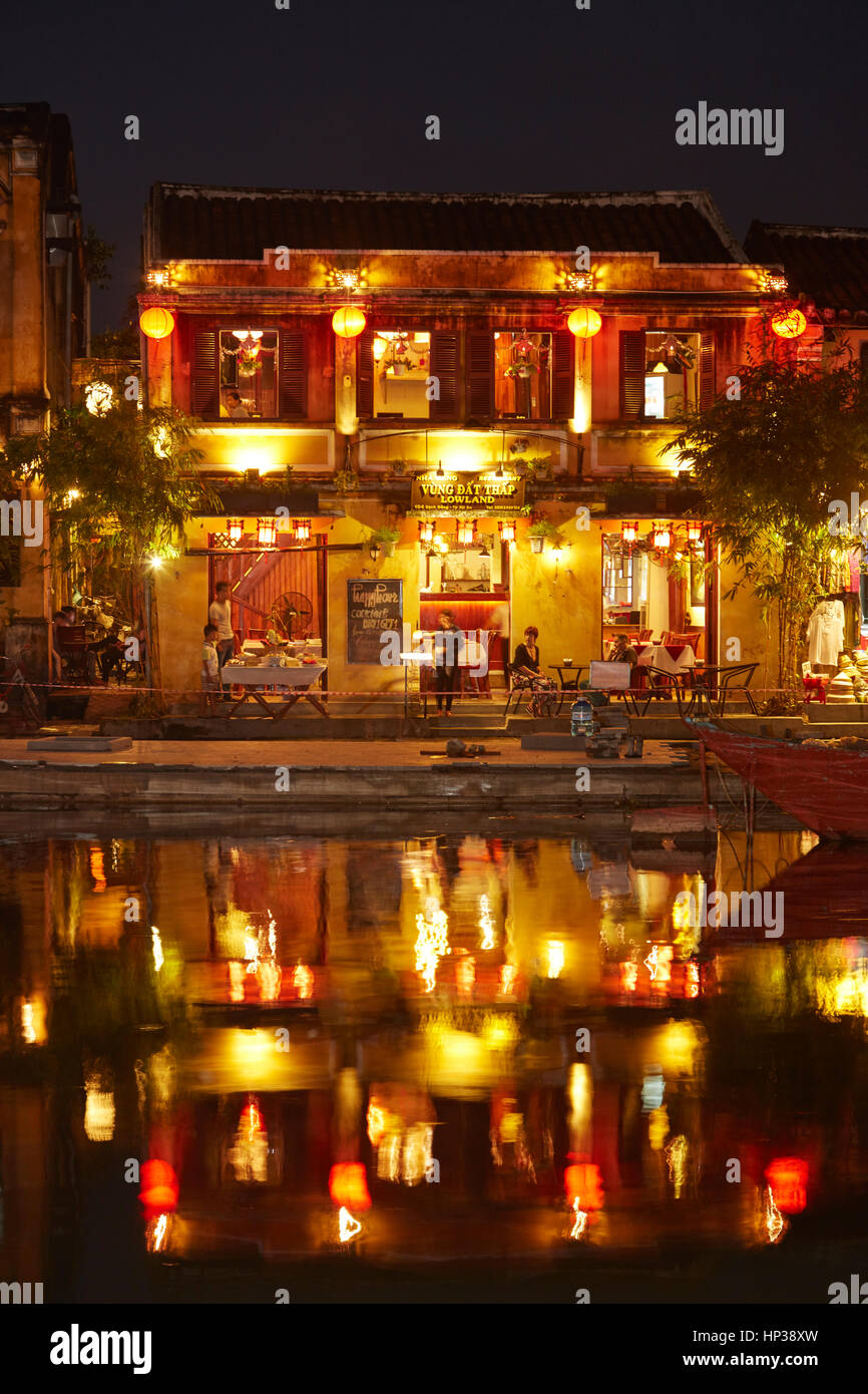 Yung Dat Thap - Lowland Restaurant reflected in Thu Bon River at dusk, Hoi An (UNESCO World Heritage Site), Vietnam Stock Photo