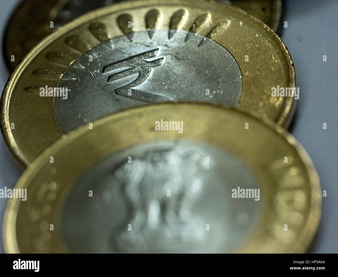 Close-up pictures of Indian currency coins showing details, yellow and white metal Stock Photo