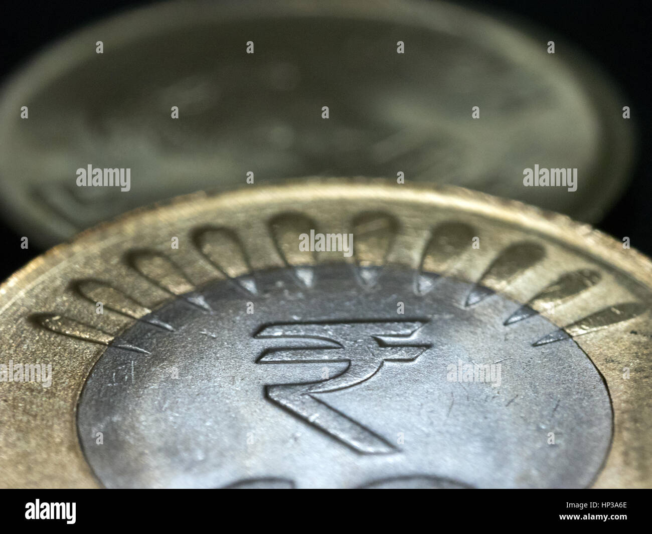 Close-up pictures of Indian currency coins showing details, yellow and white metal Stock Photo