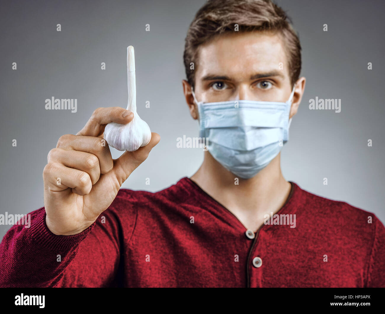 Handsome man wears protective mask against infectious diseases and flu ...