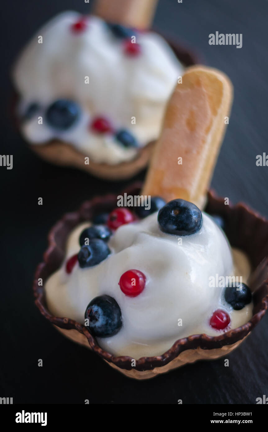 waffle baskets with vanilla ice cream and berries blueberry Stock Photo ...