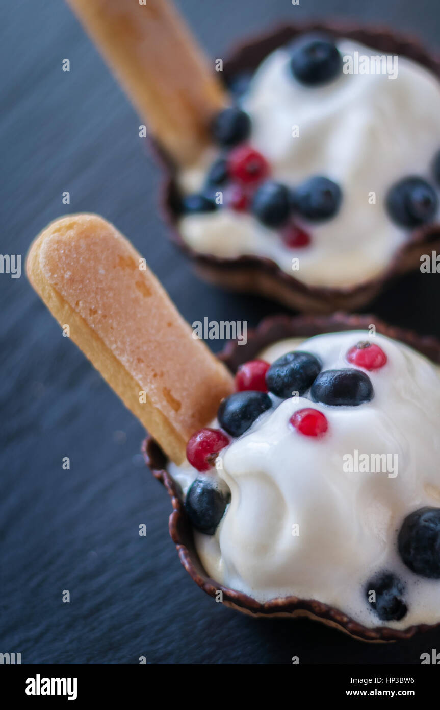 waffle baskets with vanilla ice cream and berries blueberry Stock Photo ...