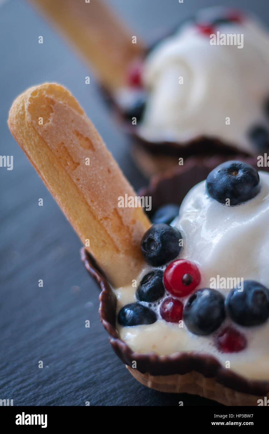waffle baskets with vanilla ice cream and berries blueberry Stock Photo ...
