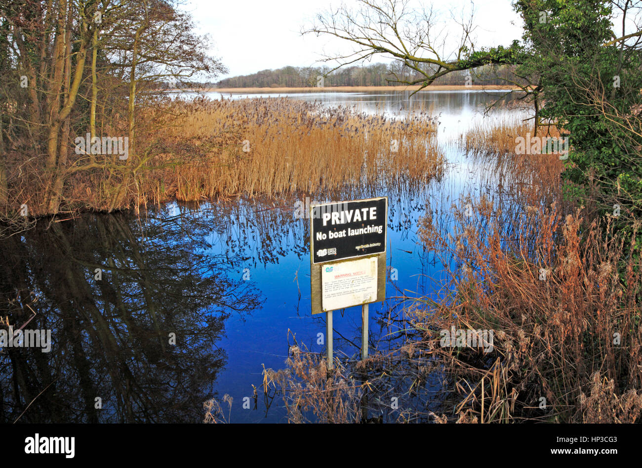 A notice prohibiting the launching of boats into Ormesby Little Broads on the Norfolk Broads at Filby, Norfolk, England, United Kingdom. Stock Photo