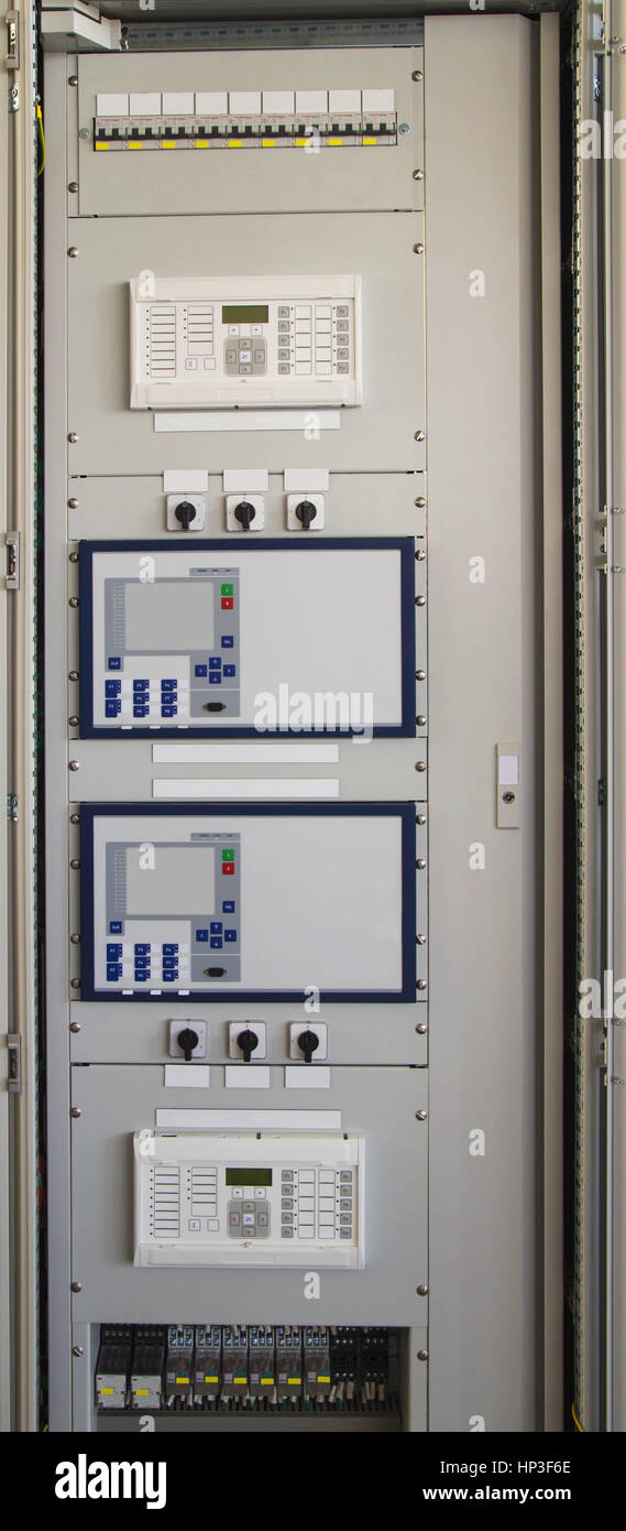 Electrical control panel with electronic devices in modern electrical ...