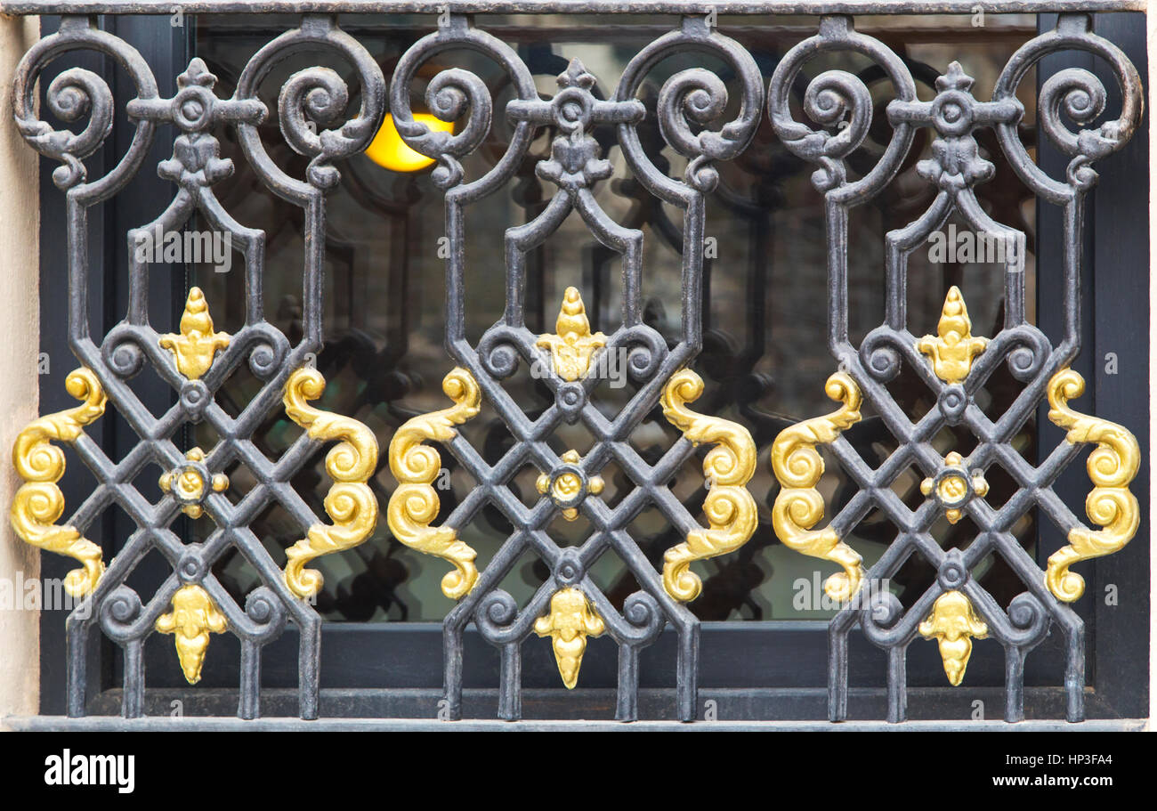 Window with decorative metal grid Stock Photo - Alamy
