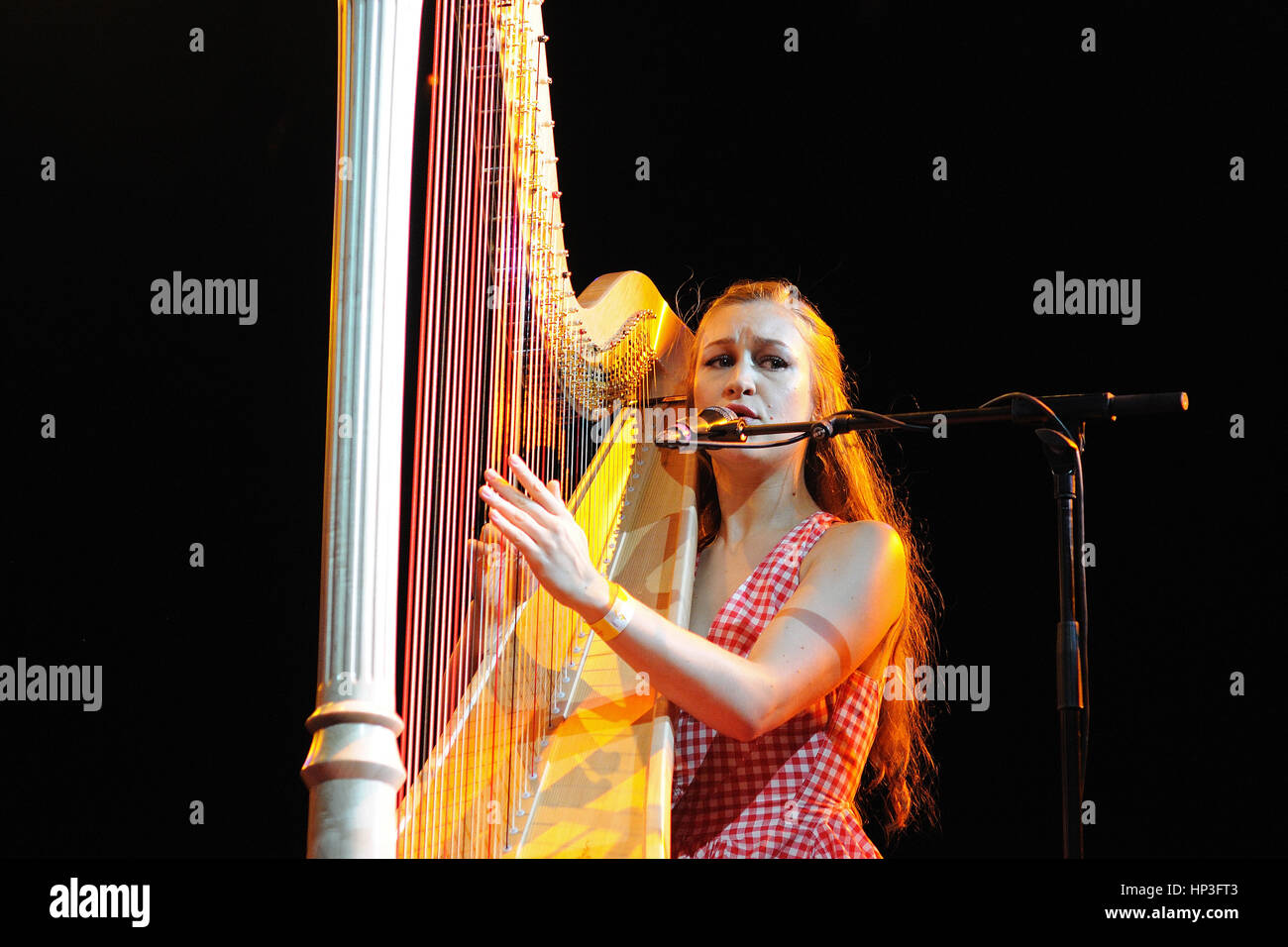 BARCELONA - JAN 20: Joanna Newsom, singer and harp player, performs at Palau de la Musica on January 20, 2011 in Barcelona, Spain. Stock Photo