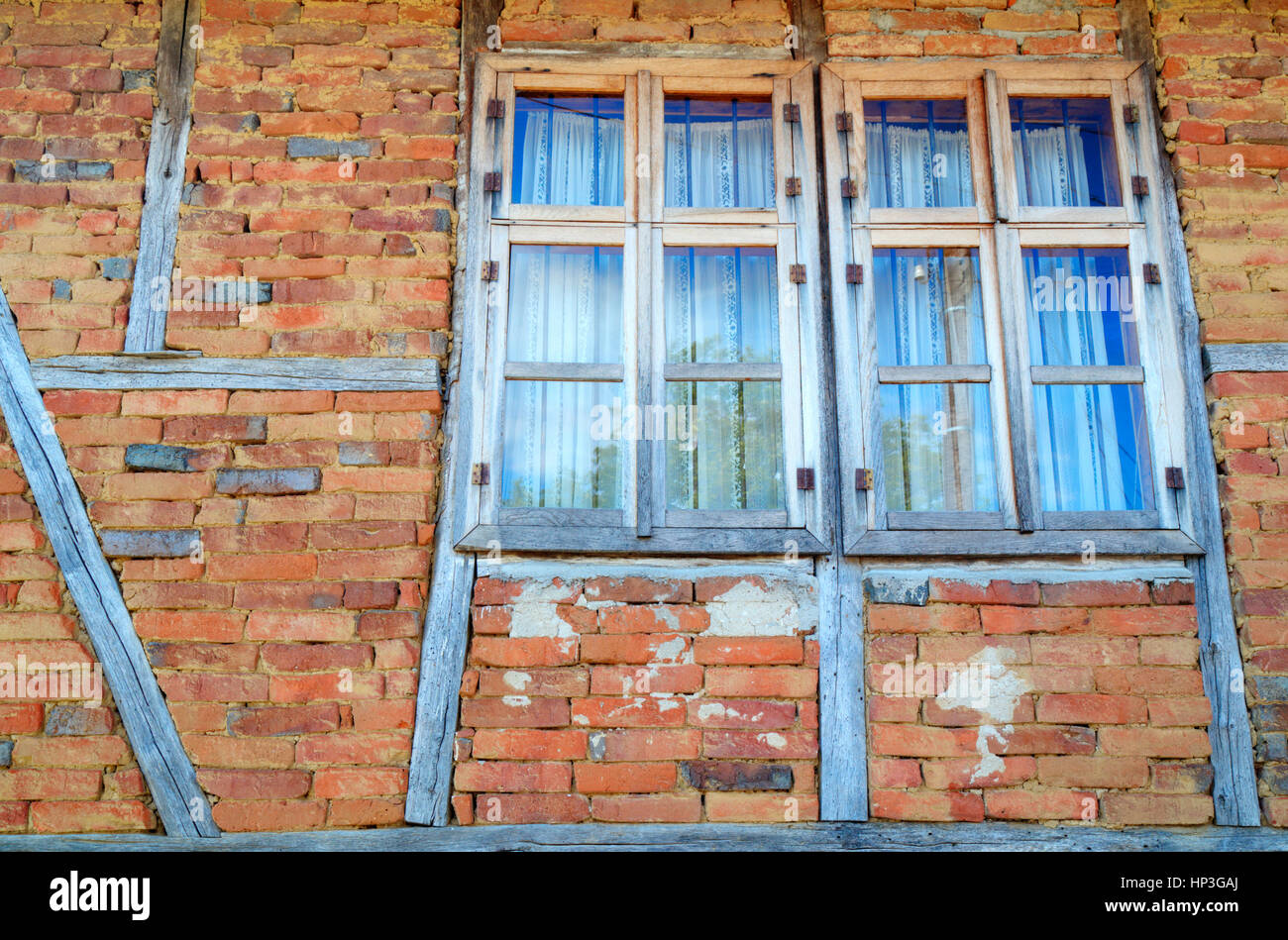 Old wooden windows on brick wall Stock Photo - Alamy