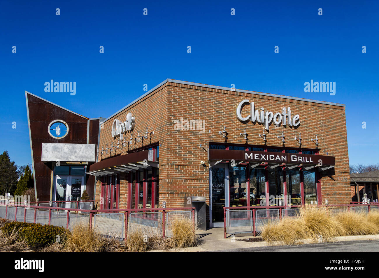 Indianapolis - Circa February 2017: Chipotle Mexican Grill Restaurant. Chipotle is a Chain of Burrito Fast-Food Restaurants IX Stock Photo