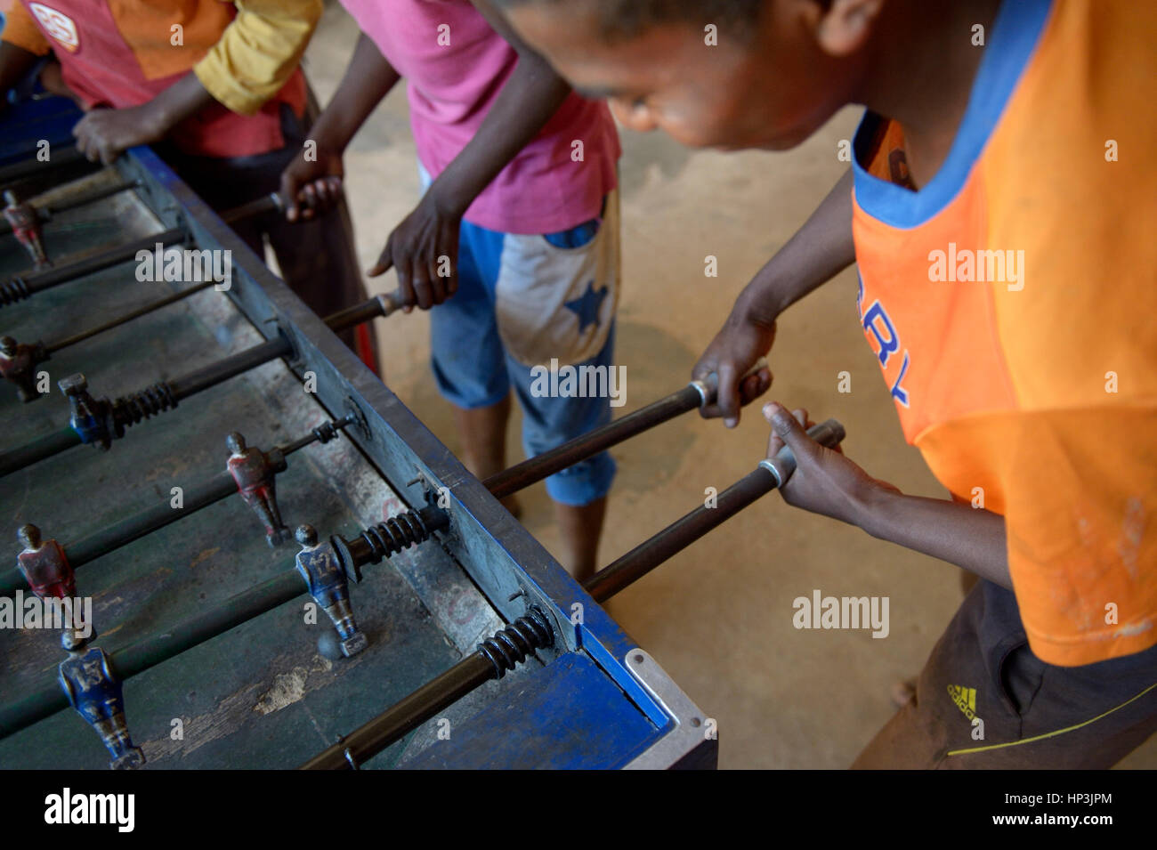 Boys play table football, Fianarantsoa province, Madagascar Stock Photo