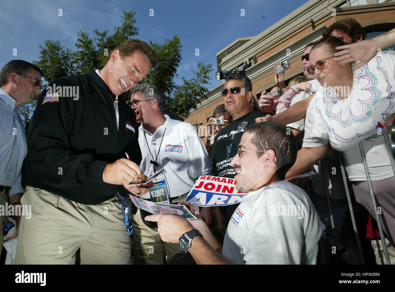 California gubernatorial candidate Arnold Schwarzenegger  signs autographs for supporters during a campaign rally in Modesto, Calif. on Saturday, 4 , October 2003. Schwarzenegger is running in the 7 October recall election. Photo by Francis Specker Stock Photo