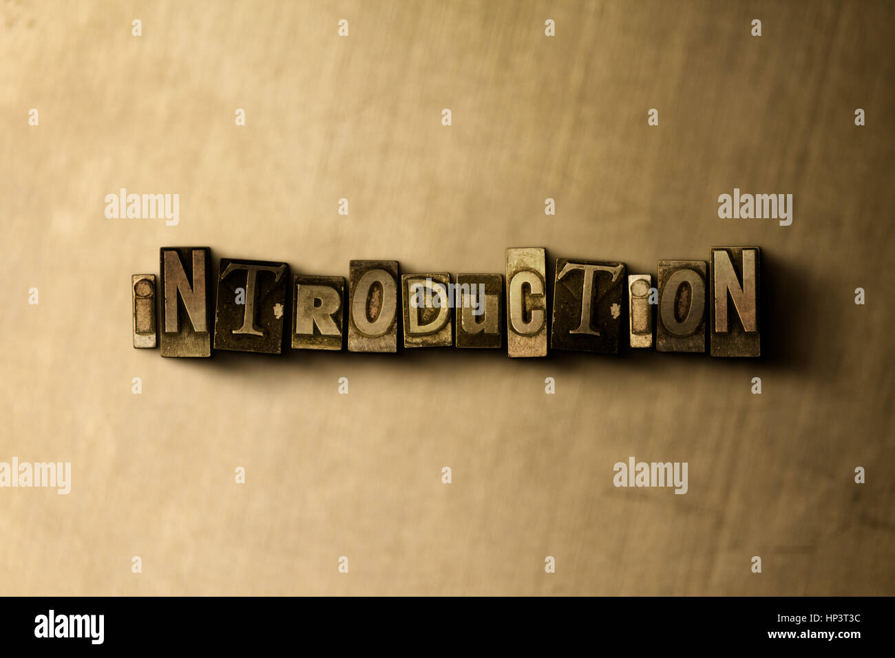 INTRODUCTION - close-up of grungy vintage typeset word on metal backdrop. Royalty free stock illustration.  Can be used for online banner ads and dire Stock Photo