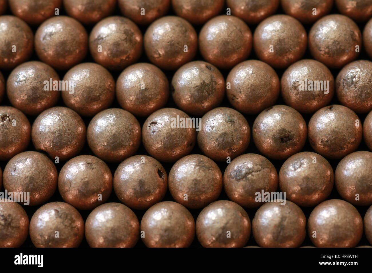 Macro of copper ball bearings Stock Photo