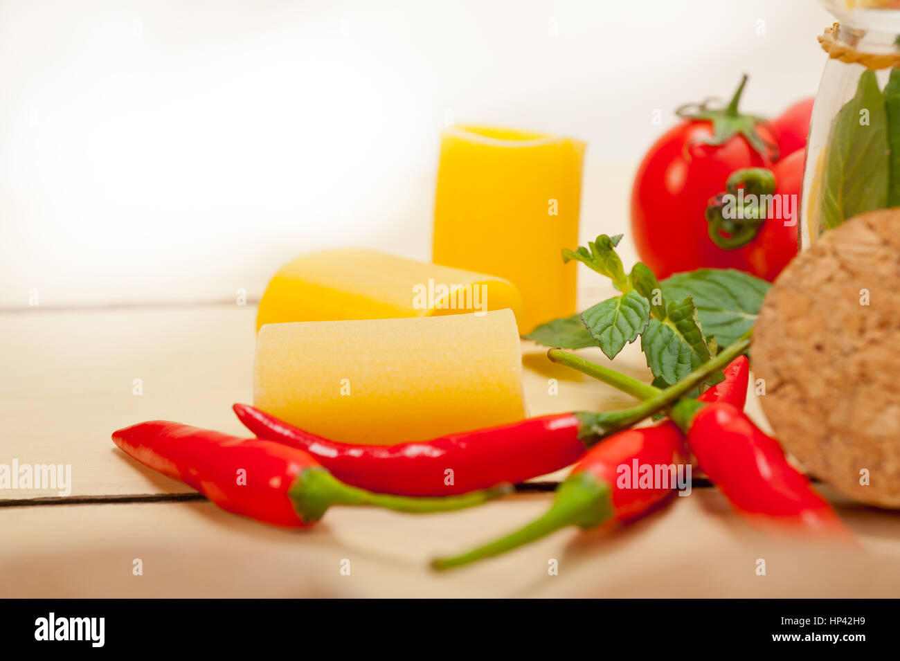 Italian pasta paccheri or schiaffoni with tomato mint and chili pepper ingredients Stock Photo