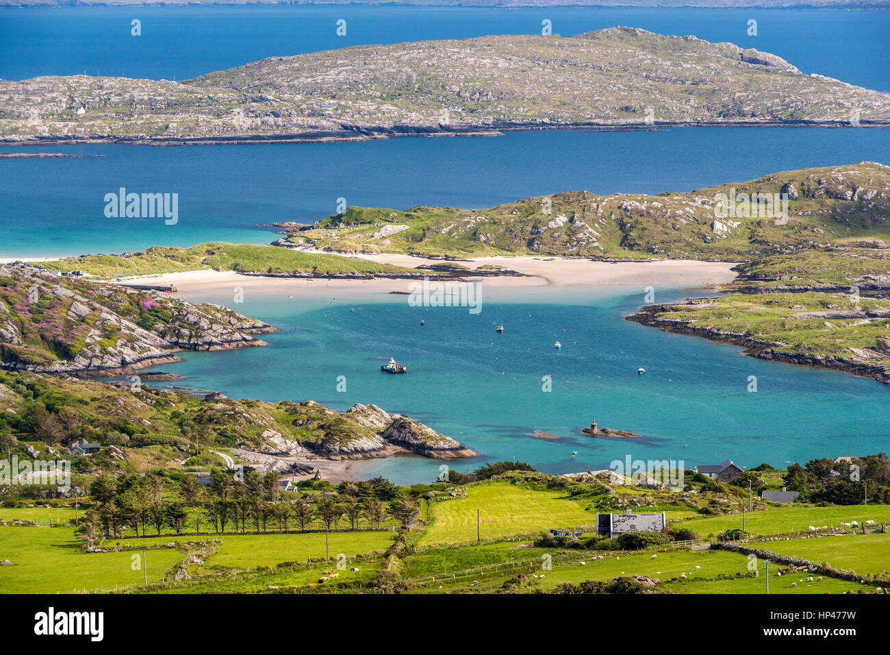 Panoramic views over Kenmare River, Abbey Island, Deenish Island and Scariff Island from Com an Chiste Pass, Ring of Kerry, Iveragh peninsula, County  Stock Photo